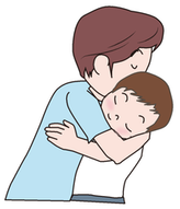 子どもを抱きしめる親